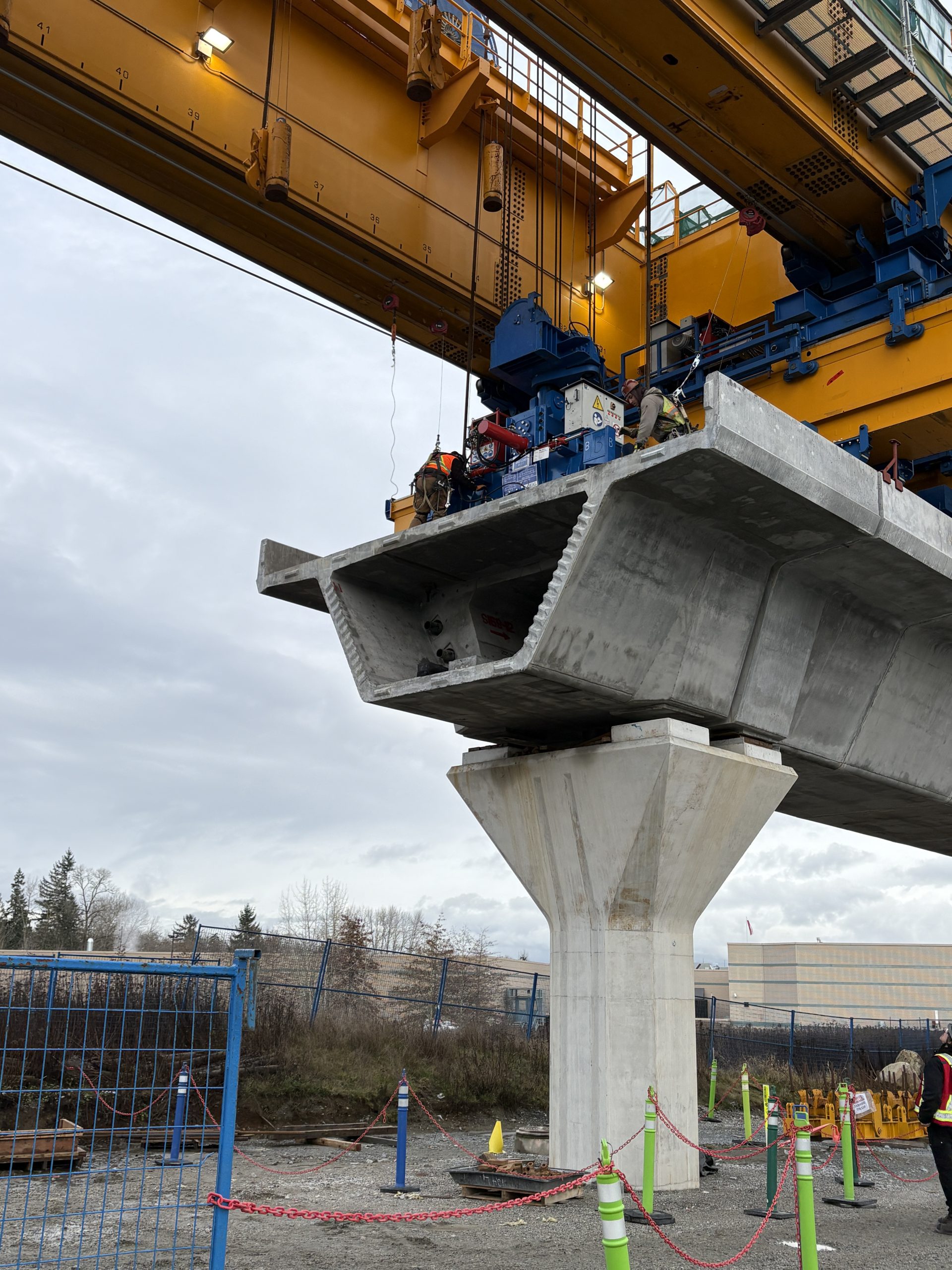 An image showing crews working on the elevated guideway just west of Bakerview-166 Street Station.